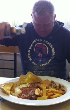 Chris tucks into a snack at The H Cafe, Berinsfield